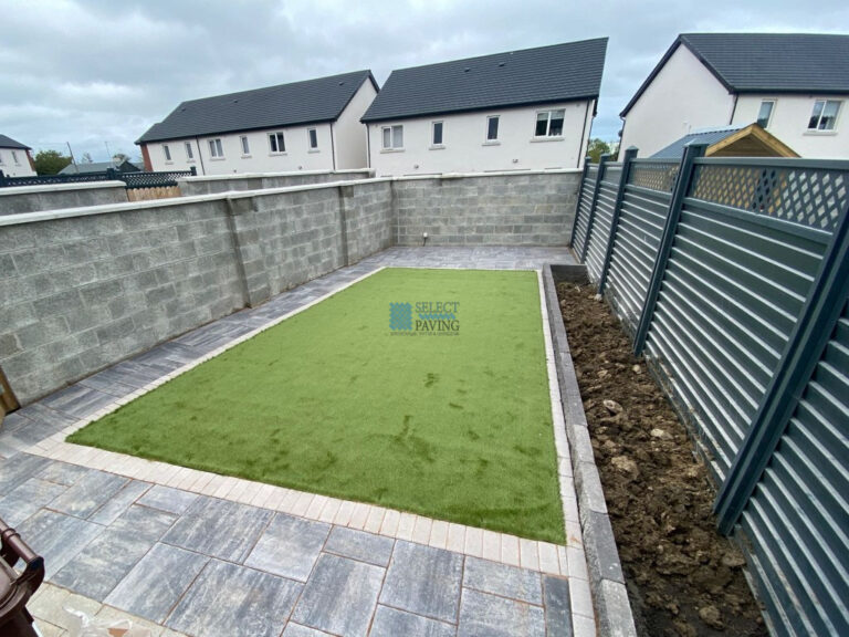 Patio with Silver Grey Flagstones, Artificial Lawn and Flower Beds in Swords, Dublin